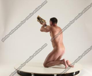 2020 01 MICHAEL NAKED MAN KNEELING POSE WITH GUNS (17)